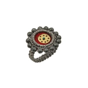 Handmade deep red velvet ring with circular embroidered element, hematite beads and a brass center on a macramé base.