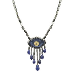 Handmade dusty blue velvet evil-eye necklace with hematite beads, jade teardrop stones and a brass sun detail on an adjustable hematite chain.