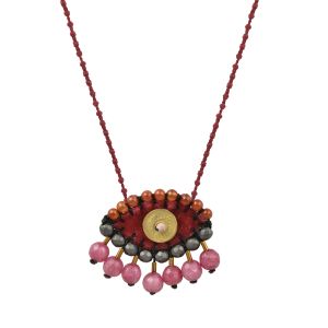 Hand-embroidered burgundy velvet evil eye necklace with hematite, jade, carnelian and a brass center on knotted cord.