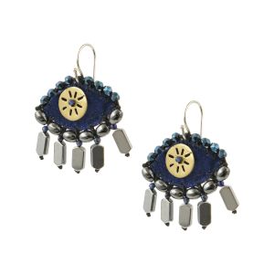 Blue velvet evil-eye earrings embroidered with hematite and lapis lazuli stones, finished with a handcrafted brass sun.