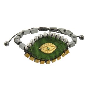 Green velvet evil-eye bracelet embroidered with hematite stones, a handcrafted brass eye, hematite rosary beads and a macramé closure.